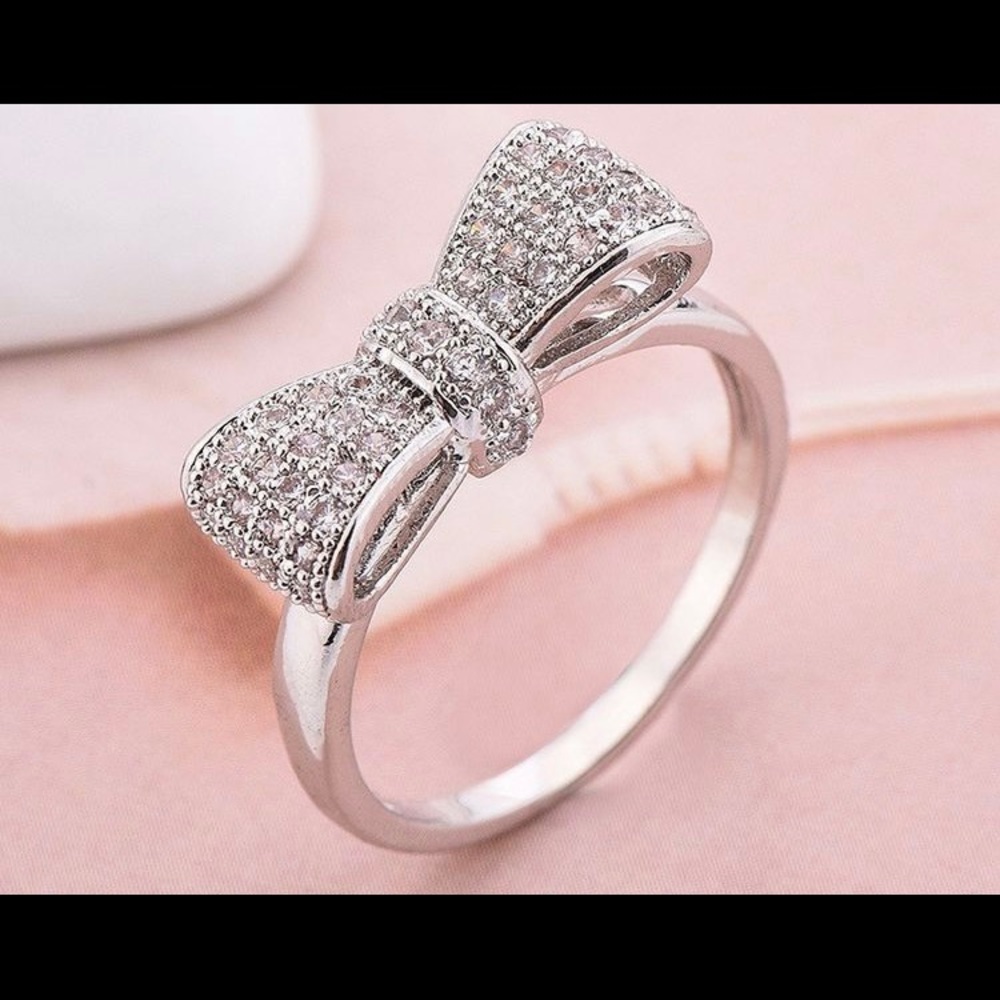 White sapphire bow ring